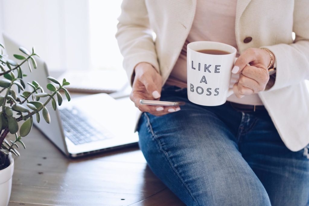 matrix mlm compensation plan lady with coffee like a boss on mobile ByDesign Technologies