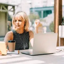 mlm software tools woman with laptop