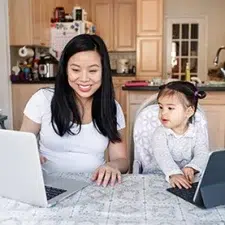 MLM Owner working at home with kids