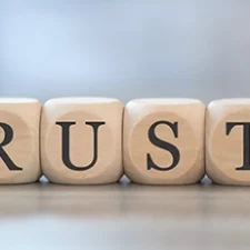 Concept of trust on wooden blocks