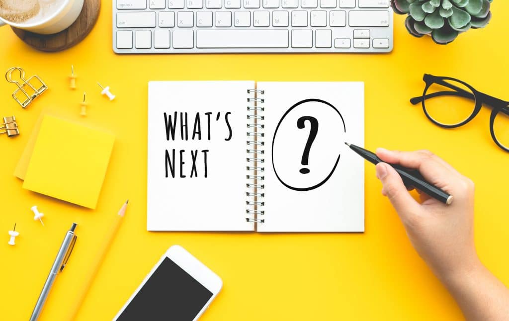 MLM Business inspiration concepts with woman writing What's next? text on paper note. Strategy and vision for work